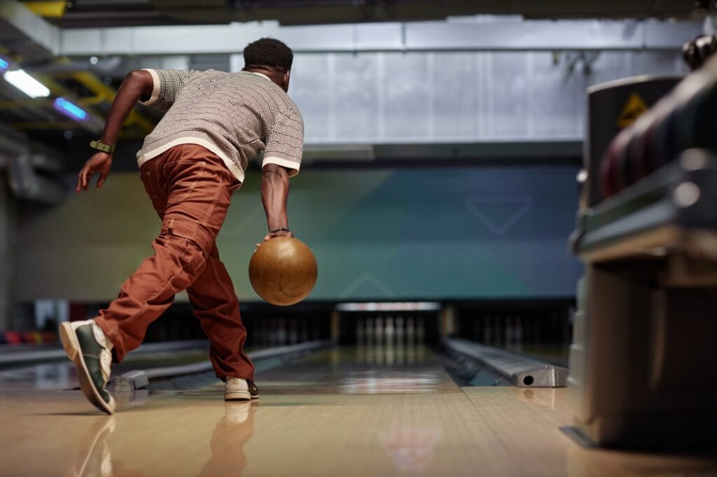 Bowler Release Bowling Ball in Modern Alley