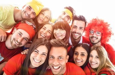 Happy sport friends taking selfie at world soccer event